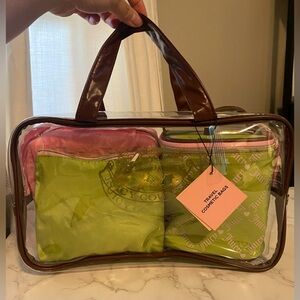 JUICY COUTURE TRANSPARENT TRAVEL COSMETIC BAG SET - PINK, GREEN, AND BROWN